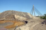 Ameriks: 'Juglas krasti' smilšu kalnu pie Vanšu tilta neizvedīs solītajā laikā