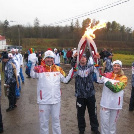 У факелоносца из Латвии олимпийский огонь не погас!