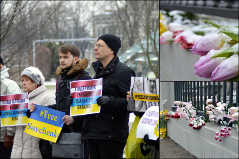 Контраст у посольства России в Риге: цветы жертвам крушения 