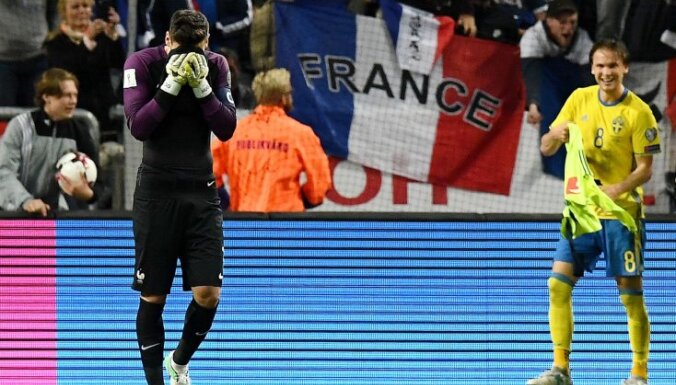 France goalkeeper Hugo Lloris reacts after goal from Sweden