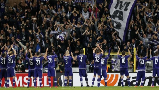 Anderlecht celebrate with fans after the game