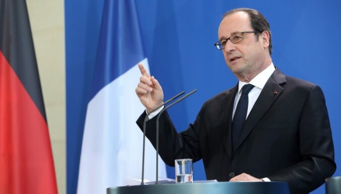 Олланд пообещал "не оставить без ответа" хакерскую атаку на штаб Макрона