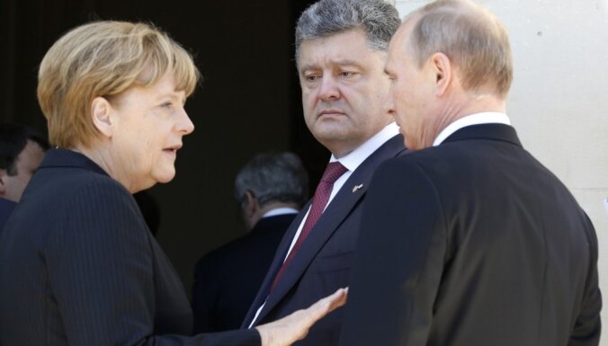 Меркель рассказала Порошенко об итогах переговоров с Путиным