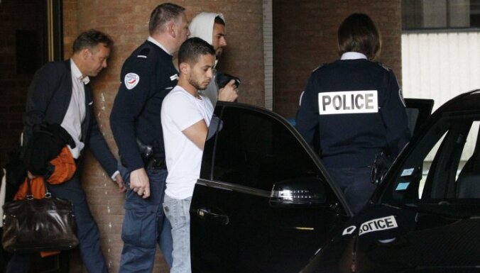 Karim Benzema leaves the court house in Versailles