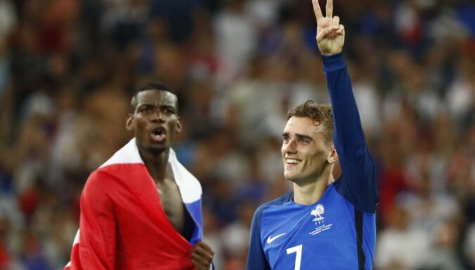 France s Paul Pogba and Antoine Griezmann