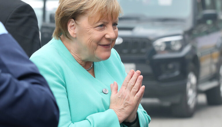 Как Меркель отдувалась за войну в Украине и беженцев